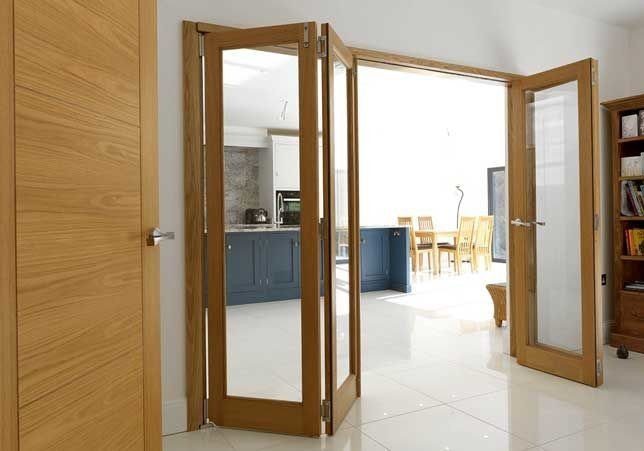 Oak clear glazed internal bi-fold doors