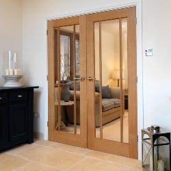 Oak veneered glass door pair in a modern home